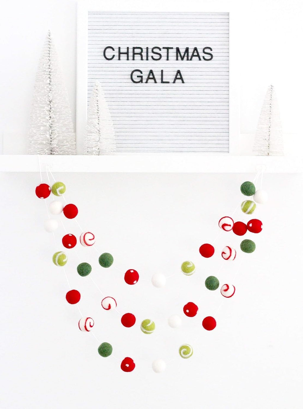 "Christmas Gala" Christmas Felt Ball Garland by Sheep Farm Felt- Red, Green, White Swirls and Dots Felt Balls. 9ft garland shown. 2.5 cm balls.