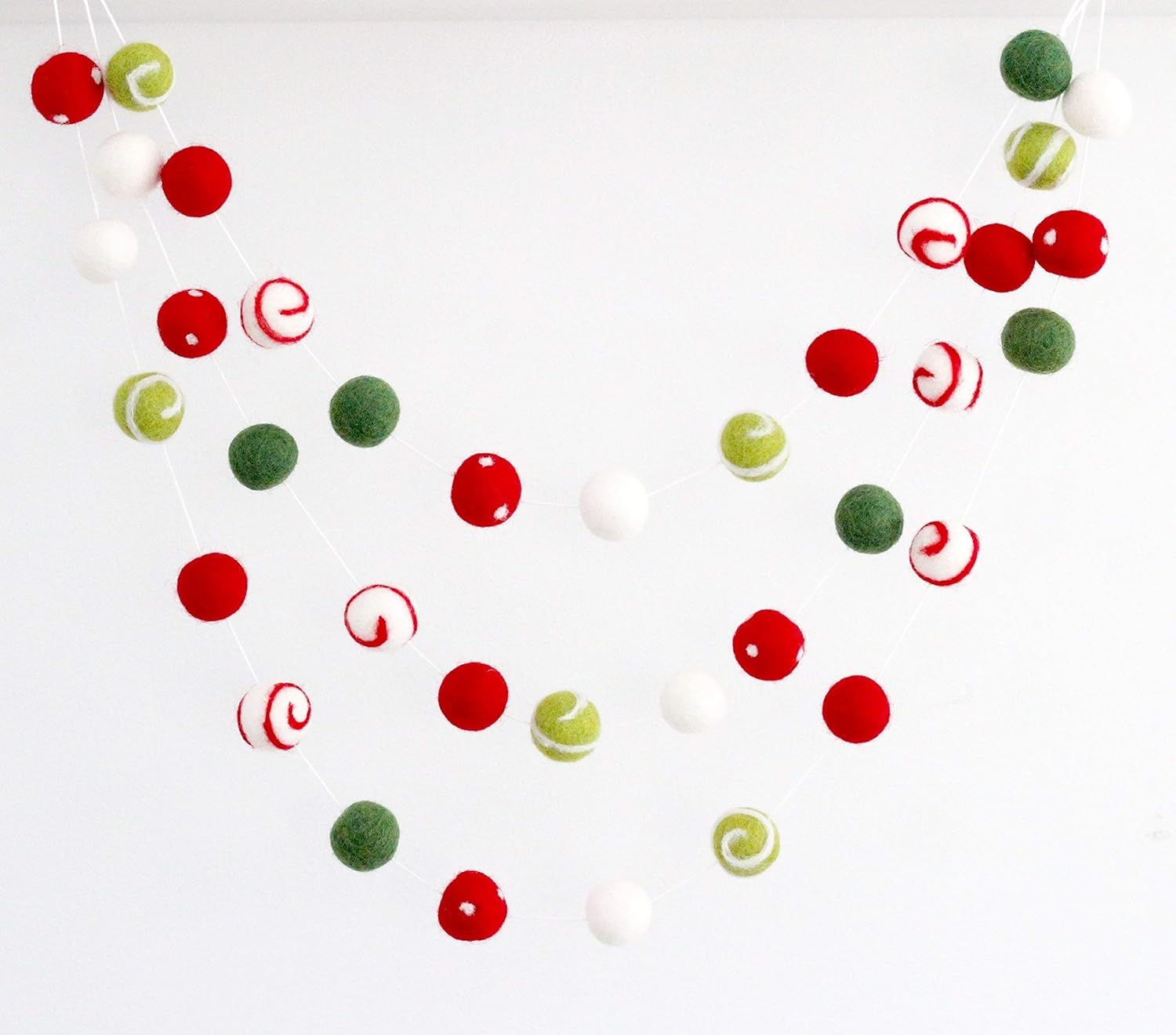 "Christmas Gala" Christmas Felt Ball Garland by Sheep Farm Felt- Red, Green, White Swirls and Dots Felt Balls. 9ft garland shown. 2.5 cm balls.
