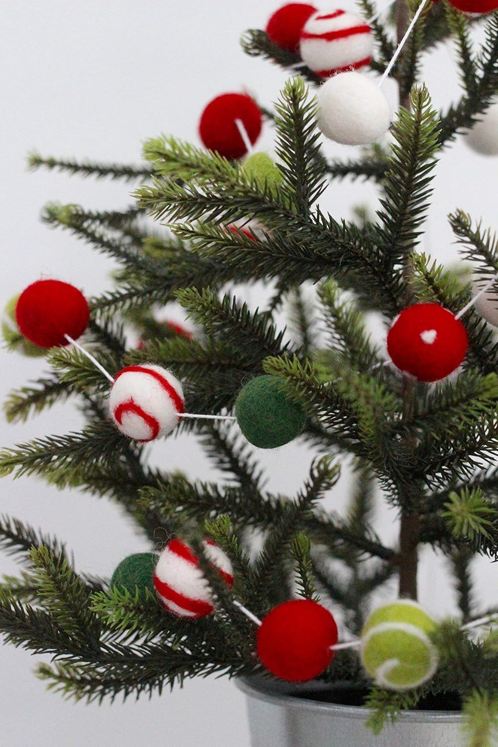 "Christmas Gala" Christmas Felt Ball Garland by Sheep Farm Felt- Red, Green, White Swirls and Dots Felt Balls. 9ft garland shown. 2.5 cm balls.