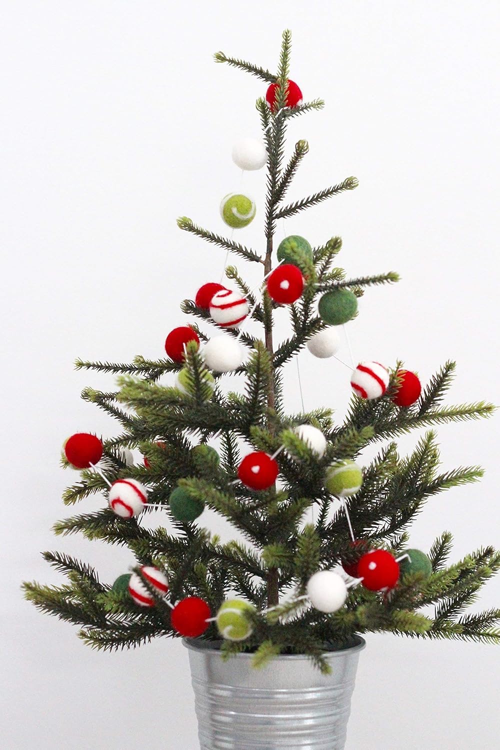 "Christmas Gala" Christmas Felt Ball Garland by Sheep Farm Felt- Red, Green, White Swirls and Dots Felt Balls. 9ft garland shown. 2.5 cm balls.